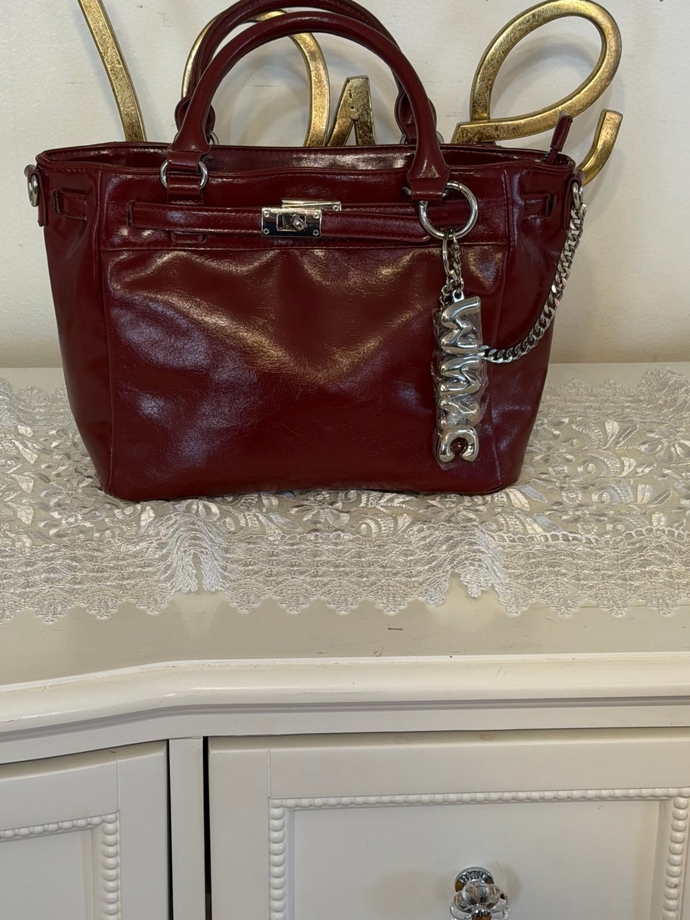 Steve Madden Deep Burgundy Satchel with Silver Charm